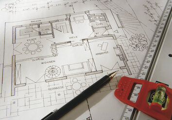 Blueprint with pen and tape measure, close up - WBF001039