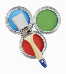 Three paint cans and paint brush on white background - WBF001115