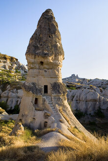 Turkey, Cappadocia, Goreme, View of rock formation at the edge of town with uchisar - PSF000513