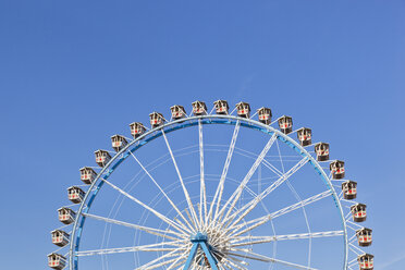 Germany, Bavaria, Munich, View of part of ferris wheel against clear sky - FOF003317