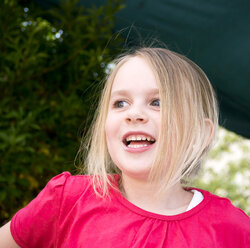 Germany, Bavaria, Girl looking away, smiling - LFF000233