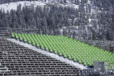 Germany, Upper Bavaria, Garmisch-Partenkirchen, View of empty seats at ski jump stadium for ski world championship - TCF001488