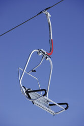 Germany, Upper Bavaria, Garmisch-Partenkirchen, View of empty chair lift - TCF001489