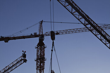 Austria, Vienna, Donau City, View of cranes at contruction of DC Towers - MBEF000101