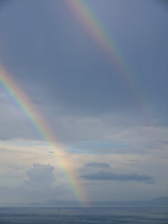 Southern Italy, Amalfi Coast, Piano di Sorrento, View of beautiful rainbow in sea at dawn - LFF000292