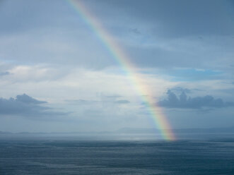 Southern Italy, Amalfi Coast, Piano di Sorrento, View of beautiful rainbow in sea at dawn - LFF000295