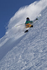 Austria, Tyrol, Pitztal, Mature man doing freestyle skiing - FFF001160