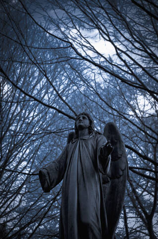 Germany, Cologne, Statue of angel at Melatenfriedhof stock photo