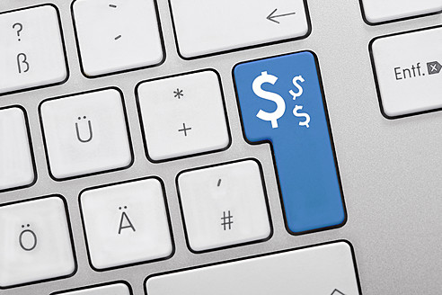 Illustration of keyboard having blue key with dollar sign, close up - TSF000296