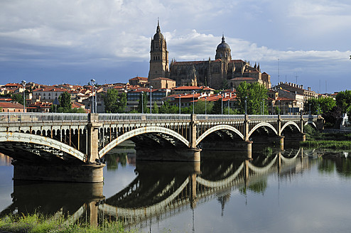 Europe, Spain, Castile and Leon, Salamanca, View of cathedral in city and bridge across Rio Tormes - ESF000103