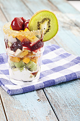 Close up of fruit salad on checked napkin - MAEF003562