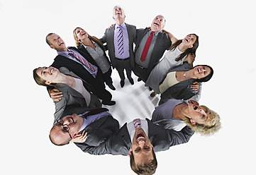 Business people forming huddle and looking up against white background - WESTF017012