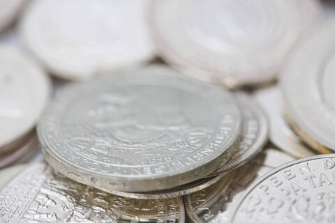 Variety of silver coins, close up stock photo