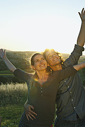 Italy, Tuscany, Young couple at dusk - PDF000196