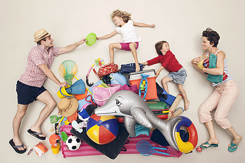 Germany, Artificial scene with family and beach toys - BAEF000323