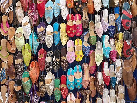 Morocco, Essaouira, Leather slippers in shop at souk - BSCF000094