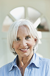 Germany, Bavaria, Senior woman smiling, portrait - WESTF017631