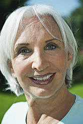 Germany, Bavaria, Senior woman smiling, portrait - WESTF017634