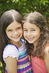 Germany, Bavaria, Sisters smiling, portrait - WESTF017707