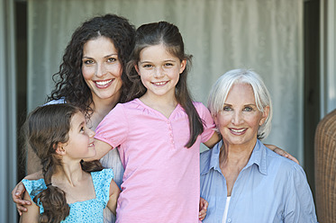 Germany, Bavaria, Family smiling together, close up - WESTF017806