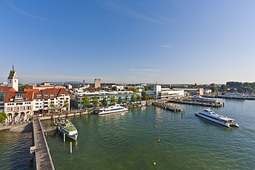 Scenic view of Friedrichshafen's harbor featuring a charming excursion boat in Baden-Wurttemberg, Germany - WD001087