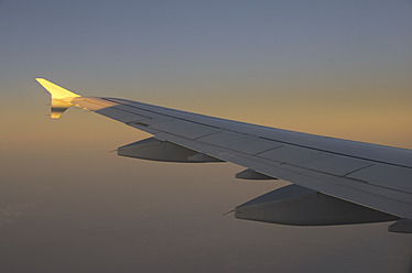 View of an airplane at dusk in Frankfurt, Hessen, Germany - MUF001127