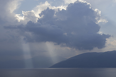 Scenic view of Ithaca's mountain range overlooking the crystal-clear waters of the Ionian Sea in Greece - MUF001131