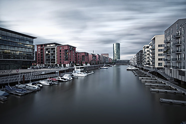 Germany, Hesse, Frankfurt, View of Westhafen harbor with city - WAF000004