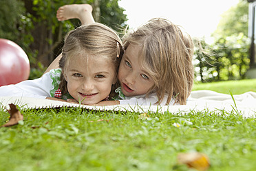 Germany, Bavaria, Munich, Girls in garden, portrait - RBF000788