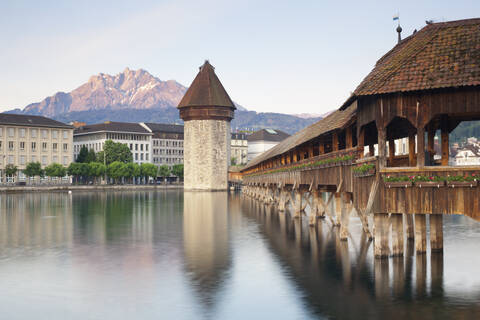 Switzerland, Lucerne, View of Chapel Bridge with water tower stock photo