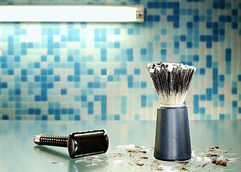 Shaving brush with shaver and hair, close up - DIKF000021