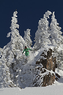 Austria, Tirol, Kitzbuehel, Man doing ski jumping - FFF001251