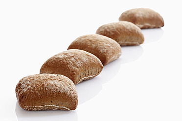 Rye and wheat mix bread on white background, close up - CSF015560