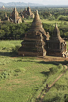 Myanmar, Burma, Bagan, Biker at pagoda temple - FFF001256