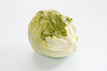 Iceberg salad on white background, close up - CSF015605