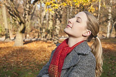 Germany, Berlin, Wandlitz, Mid adult woman with eyes closed, close up - WESTF018303