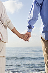 Spain, Mallorca, Senior couple holding hands - SKF000811