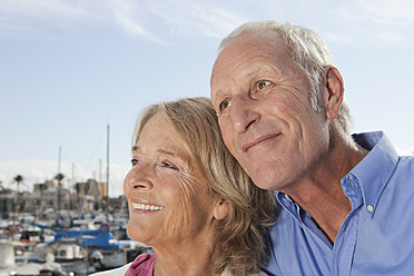 Spain, Mallorca, Palma, Senior couple at harbour, smiling - SKF000825