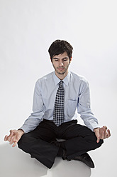 Businessman doing meditation - MAEF004204