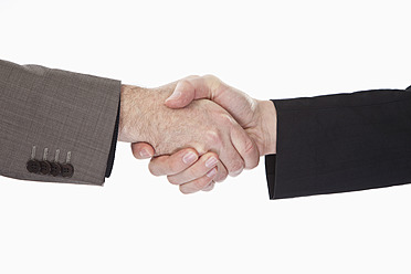 Businessman shaking hands, close up - MAEF004185