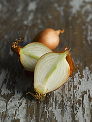 Shallot on wood, close up - KSWF000795