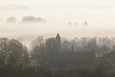 Germany, Bavaria, View of church in fog - FOF003843