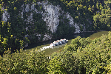 Germany, Bavaria, Lower Bavaria, View of ship in Danube River at Danube Gorge - SIE002311