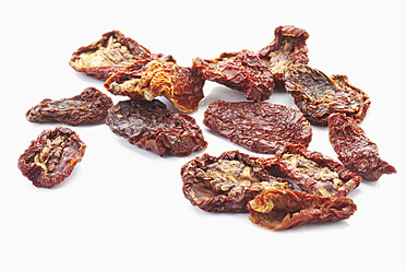 Dried tomatoes on white background - MAEF004346