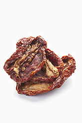 Dried tomatoes on white background - MAEF004350