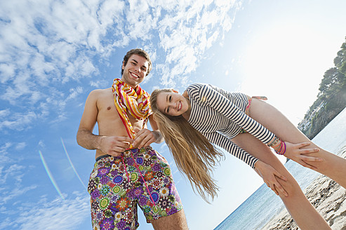 Spain, Mallorca, Couple on beach, smiling, portrait - MFPF000027