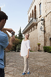 Spain, Mallorca, Palma, Couple photographing with mobile phone - SKF000920