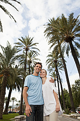 Spain, Mallorca, Palma, Couple looking away, smiling - SKF000945