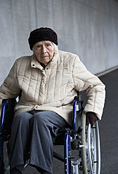 Austria, Senior woman on wheelchair at Subway - WWF002029