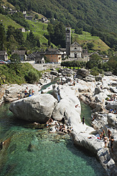 Switzerland, People bathing at Verzasca River - GWF001721